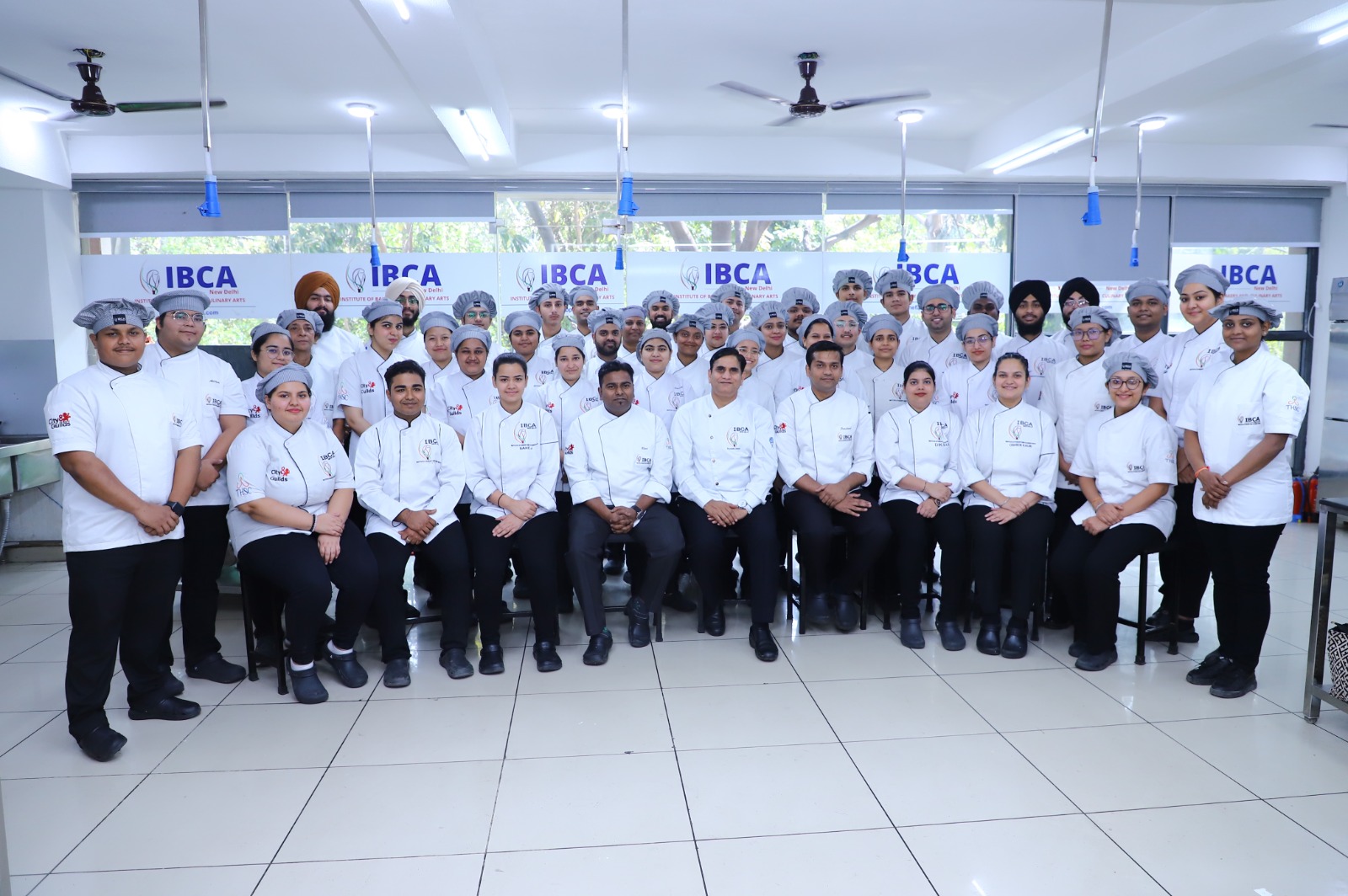 Professional chefs instructing students